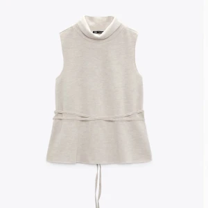 Topp med knyt i midjan  - Topp från zara, aldrig använd storlek S 