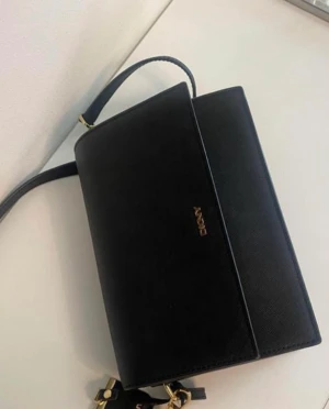 DKNY Axelremsväska  - CROSSBODY BRYANT