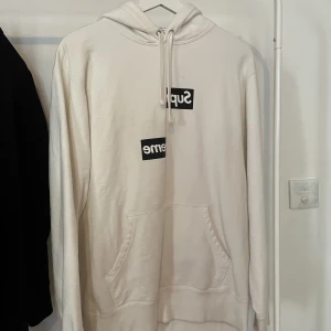 Supreme x Comme des Garcons hoodie - A hoodie from a collaboration between monster fashion icons Supreme and Comme des Garcons.  Condition: Very Good Size for women: L/ XL Size for men: M Message for more pictures.