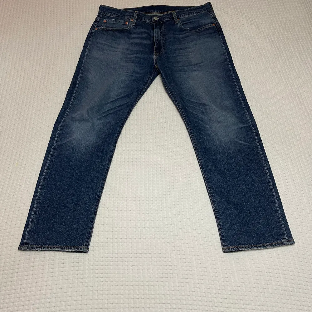 Väldigt fina Levis jeans  502 TAPER SQUEEZY JUNCTION Storlek: W36 L30. Jeans & Byxor.