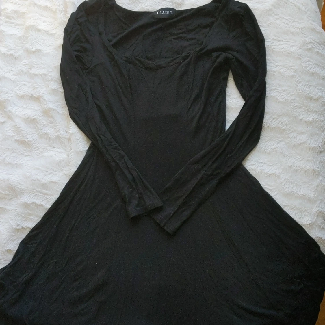 Svart långärmad klänning