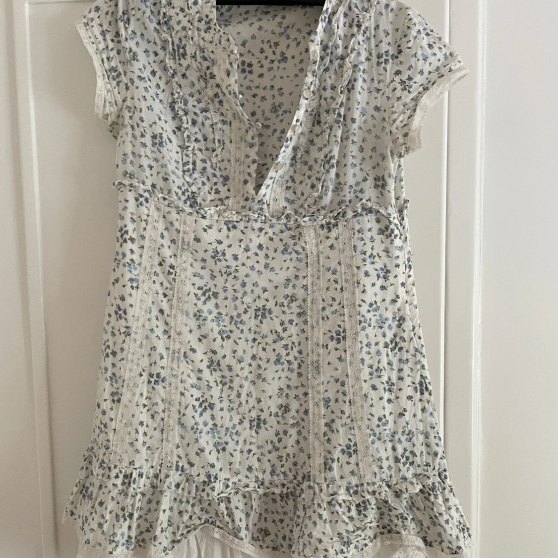 Blommig klänning - 91