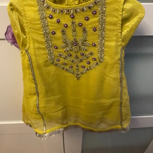 Eastern dress - Yellow eastern dress in chiffon with a purple dupatta