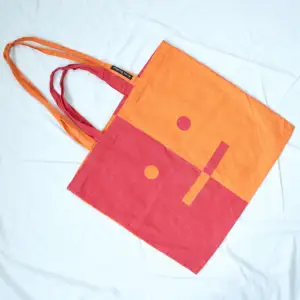 • COTTON SQUARE BAG WITH PINK AND ORANGE ACNE STUDIOS FACE LOGO PRINT. LONG AND SHORT STRAPS  • BRAND - Acne Studios 