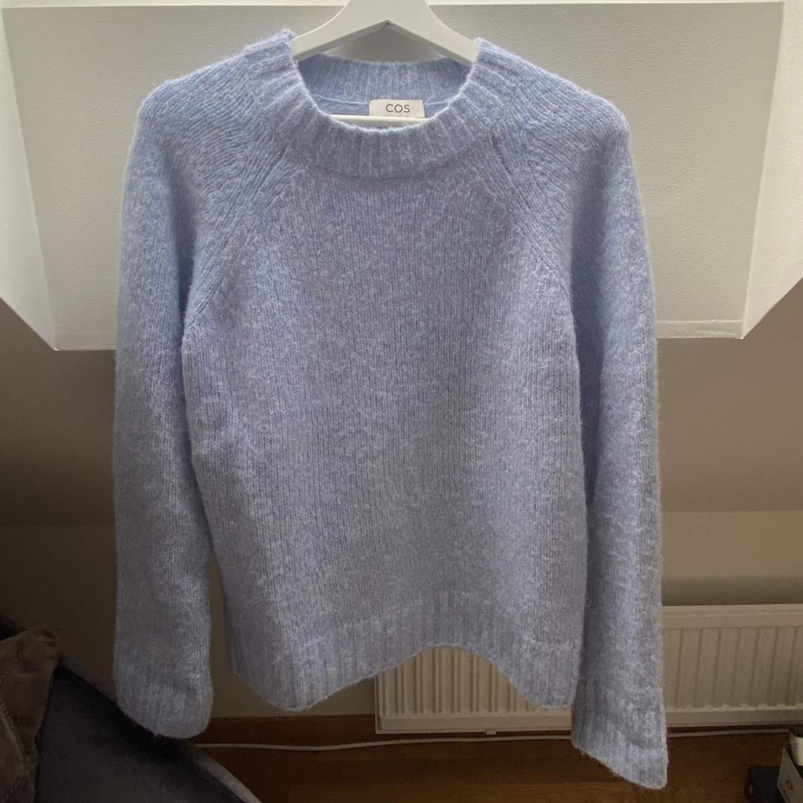 Ljusblå stickad tröja