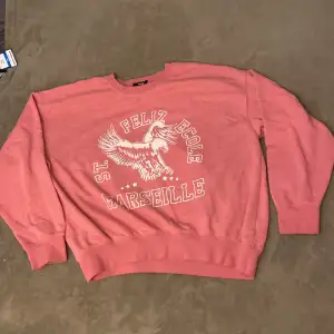 Rosa sweatshirt utan skador