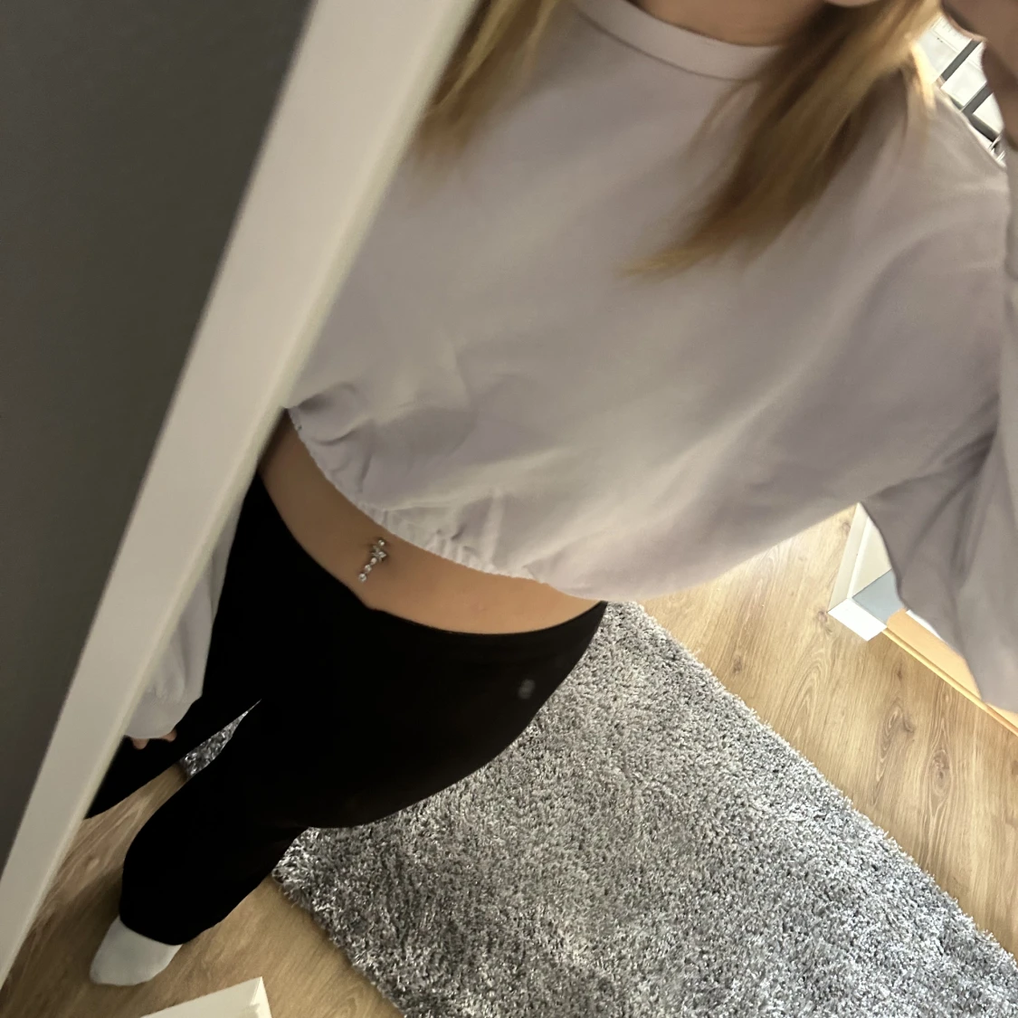 Ljus lila tjock tröja.