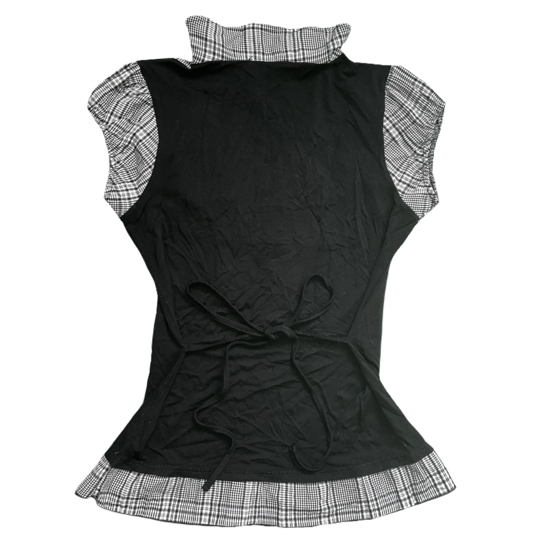 Rutig topp med svart västdetalj - 90