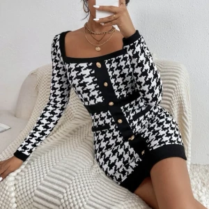 Fin och elegant svart vit klänning - ALDRIG använd