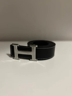 Herme’s bälte  - Helt ny. snabb, säkert frakt 
