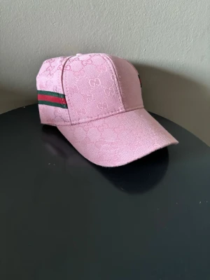 Rosa gg keps - Helt ny. Unik färg men väldigt fin