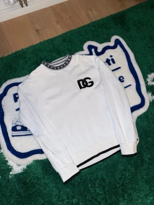 Dolce Gabbana White DG Logo Crewneck  - Dolce Gabbana White DG Logo Crewneck | Authentic - comes with legit check | Condition:9/10 Size:48 Fits M-L 