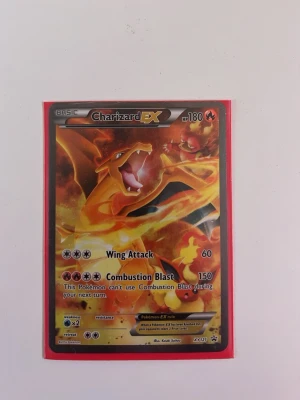 Charizard EX xy121 - Charizard EX xy121 promo, ett mycket eftertraktat kort bland många samlare