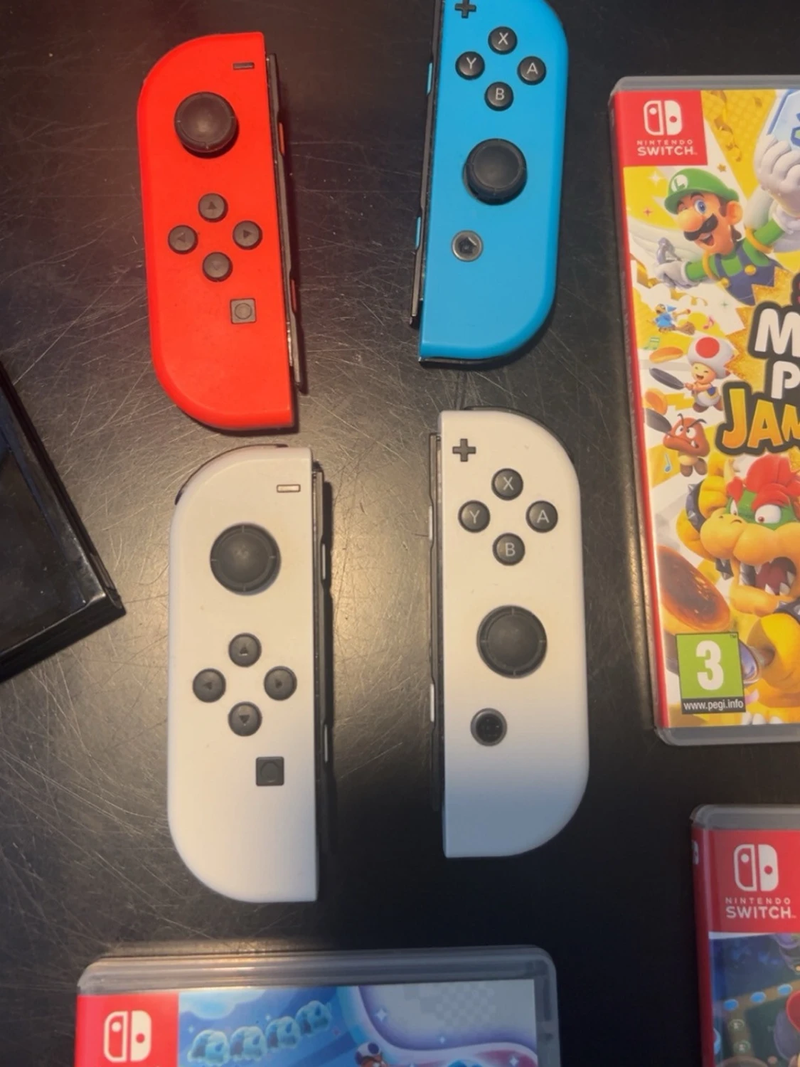 Nintendo Switch OLED med extra Joy-Cons - 1
