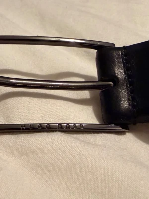 Svart skärp från Hugo Boss-carmello i skinn  - Klassisk bälte Hugo boss original pris 1399, ko skinn 