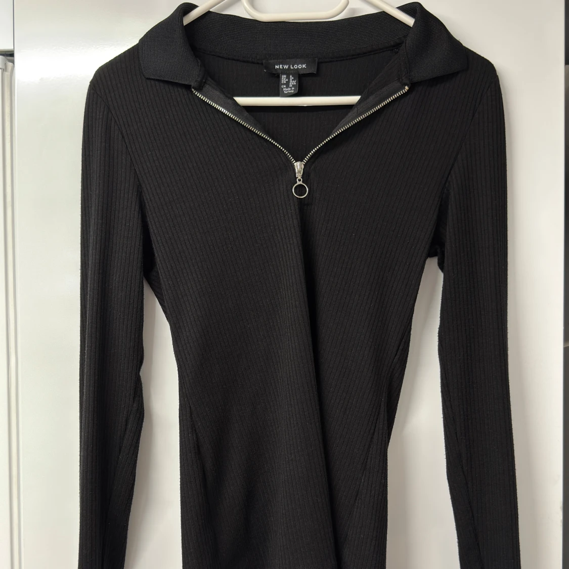 Svart ribbad långärmad polotopp från New Look