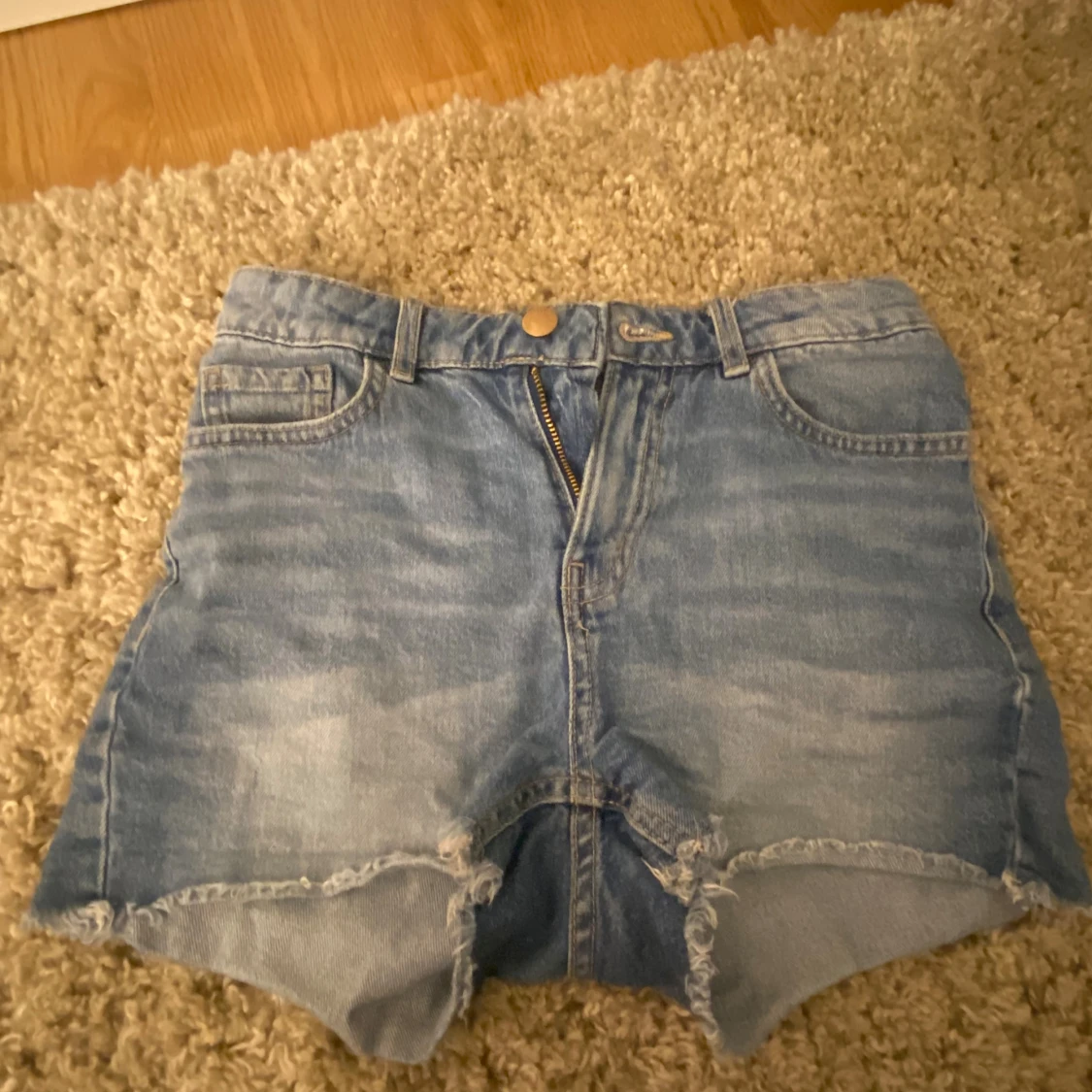 Blå jeansshorts från Lindex