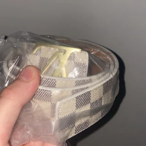 bälte - Märket är guld och inte silver