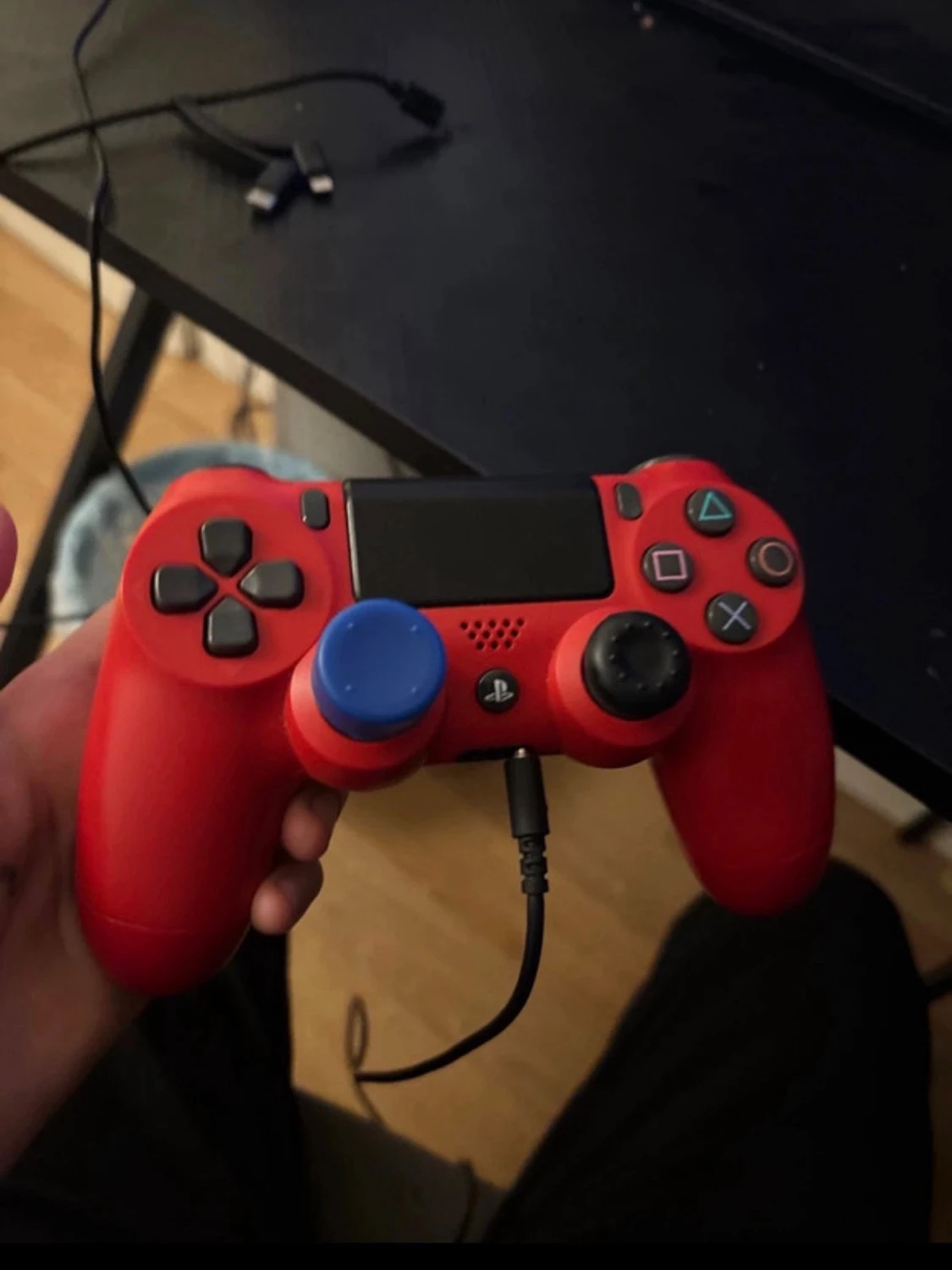 Röd PlayStation DualShock 4 handkontroll