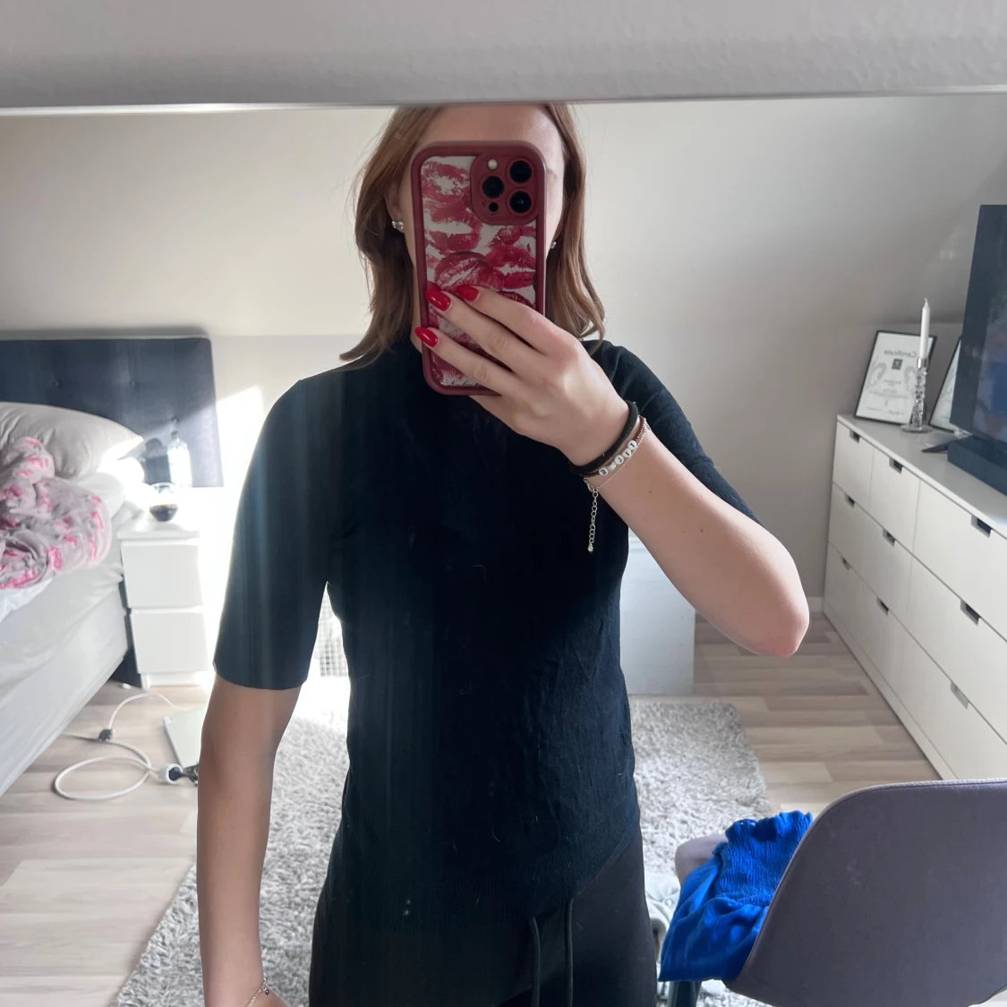 Svart stickad topp med kort ärm - 1