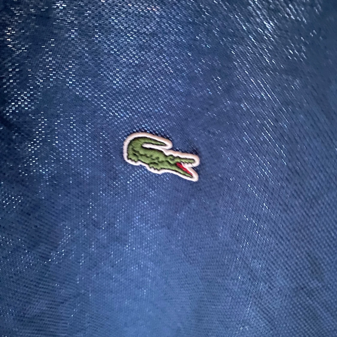 Marinblå pikétröja från Lacoste - 1