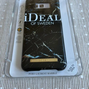 iDeal of Sweden Port Laurent Marble Case Galaxy S8 Plus - Elegant mobilskal i Port Laurent Marble-design för Galaxy S8 Plus. Slimmat, lätt och kompatibelt med trådlös laddning. Svensk design, levereras i originalförpackning och ser oanvänt ut utan synligt slitage eller defekter.
