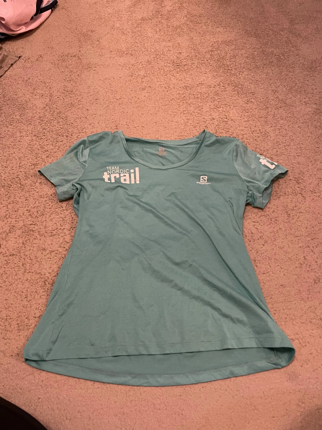 Turkos träningströja