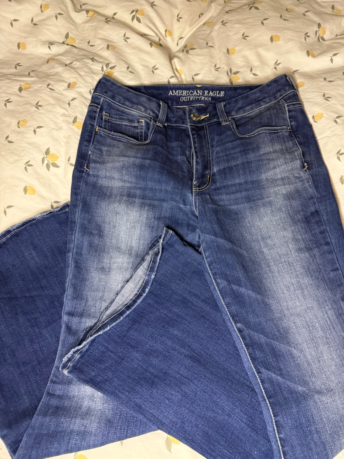 Blå bootcut jeans från American Eagle - 1