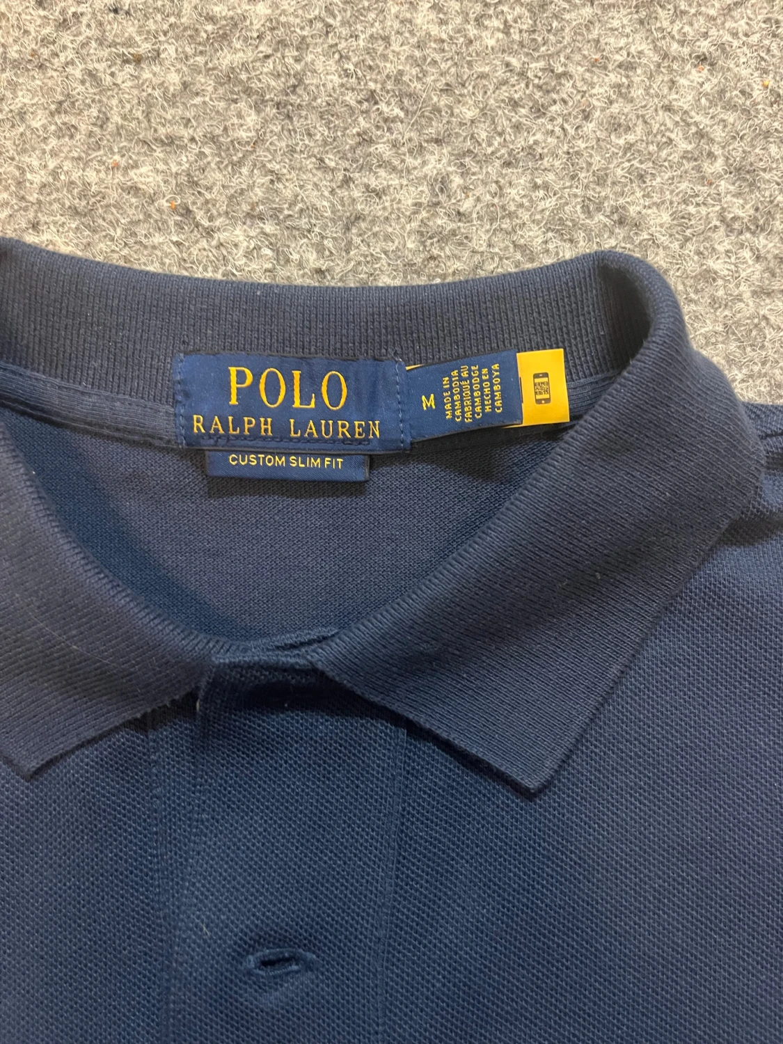 Marinblå pikétröja från Polo Ralph Lauren - 1