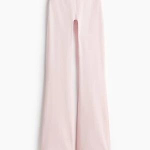 Ljusrosa wide leggings från Move - Ljusrosa yoga pants från hm i tränings material. I nyskick 