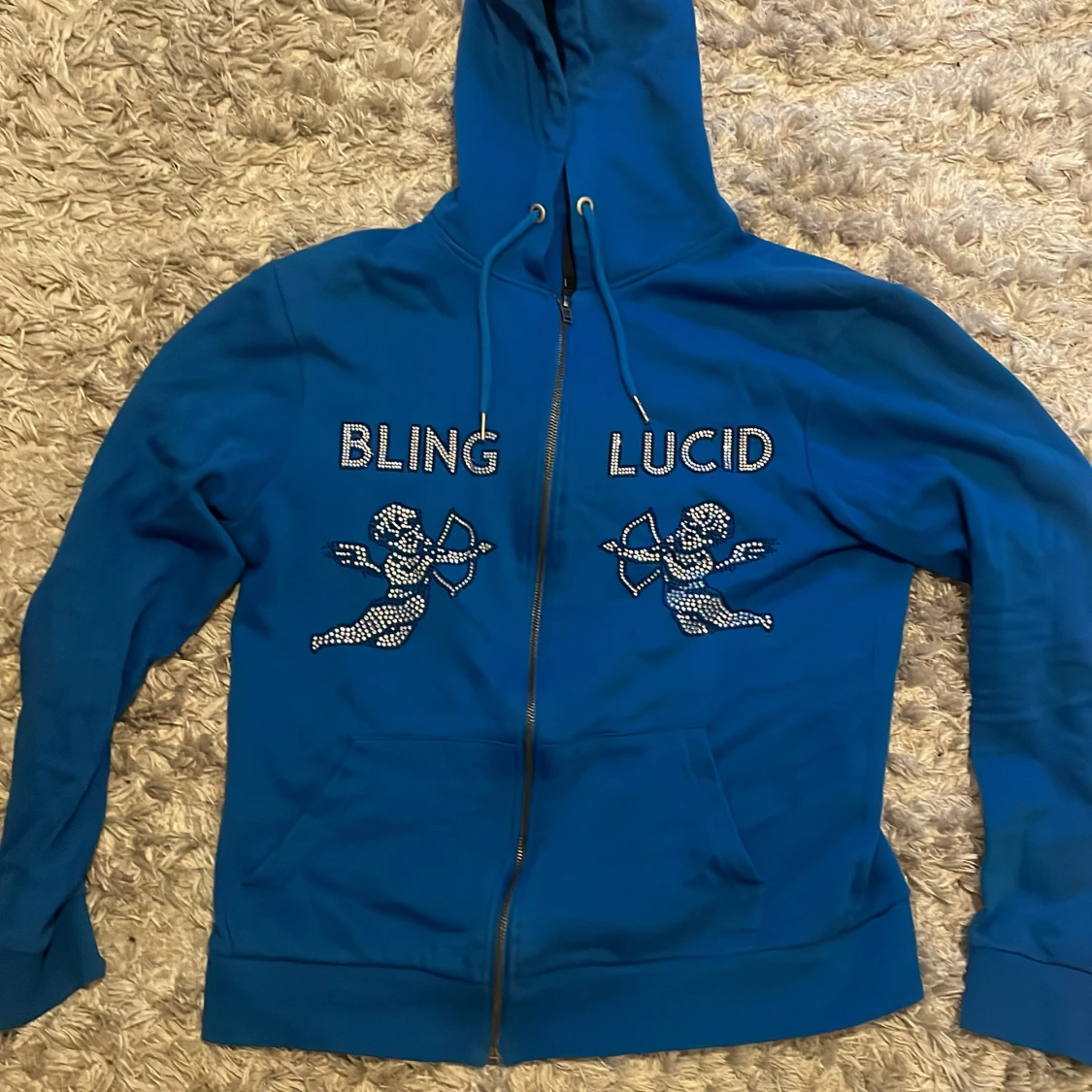 Blå hoodie med bling och ängelmotiv