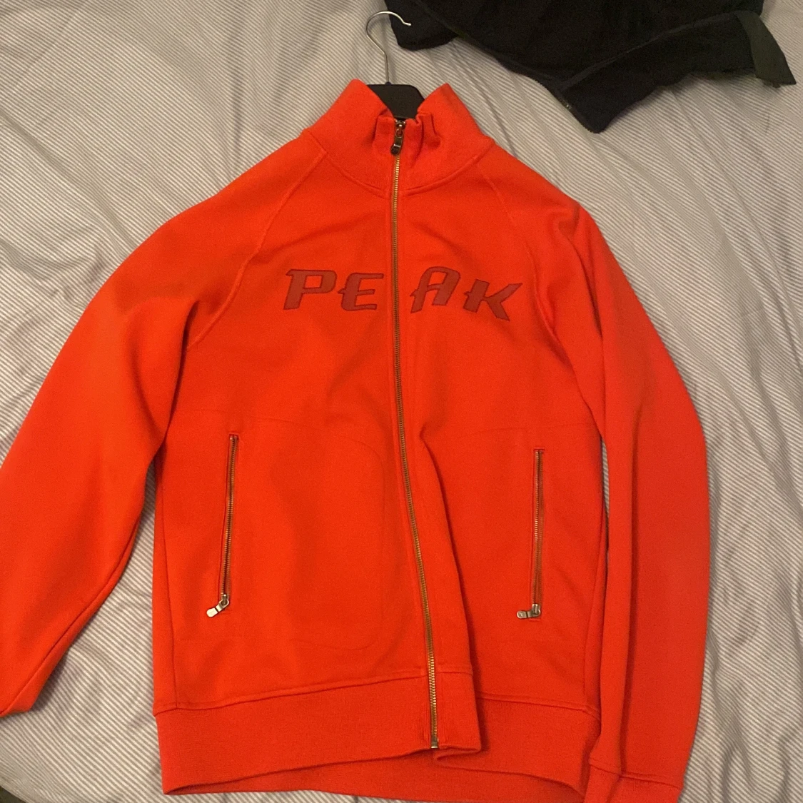Röd ziptröja Peak Performance  - 2