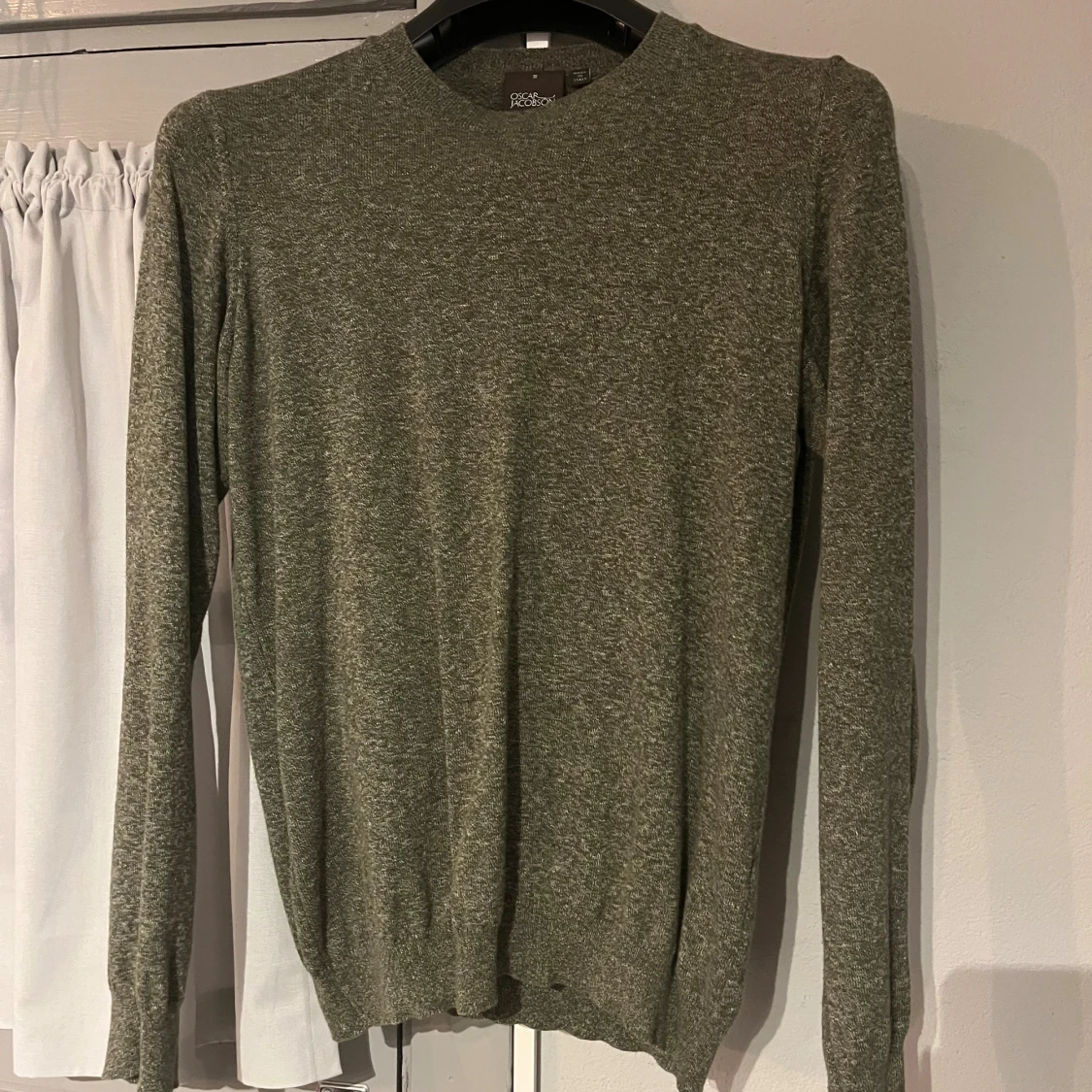 Grön stickad tröja Oscar Jacobson