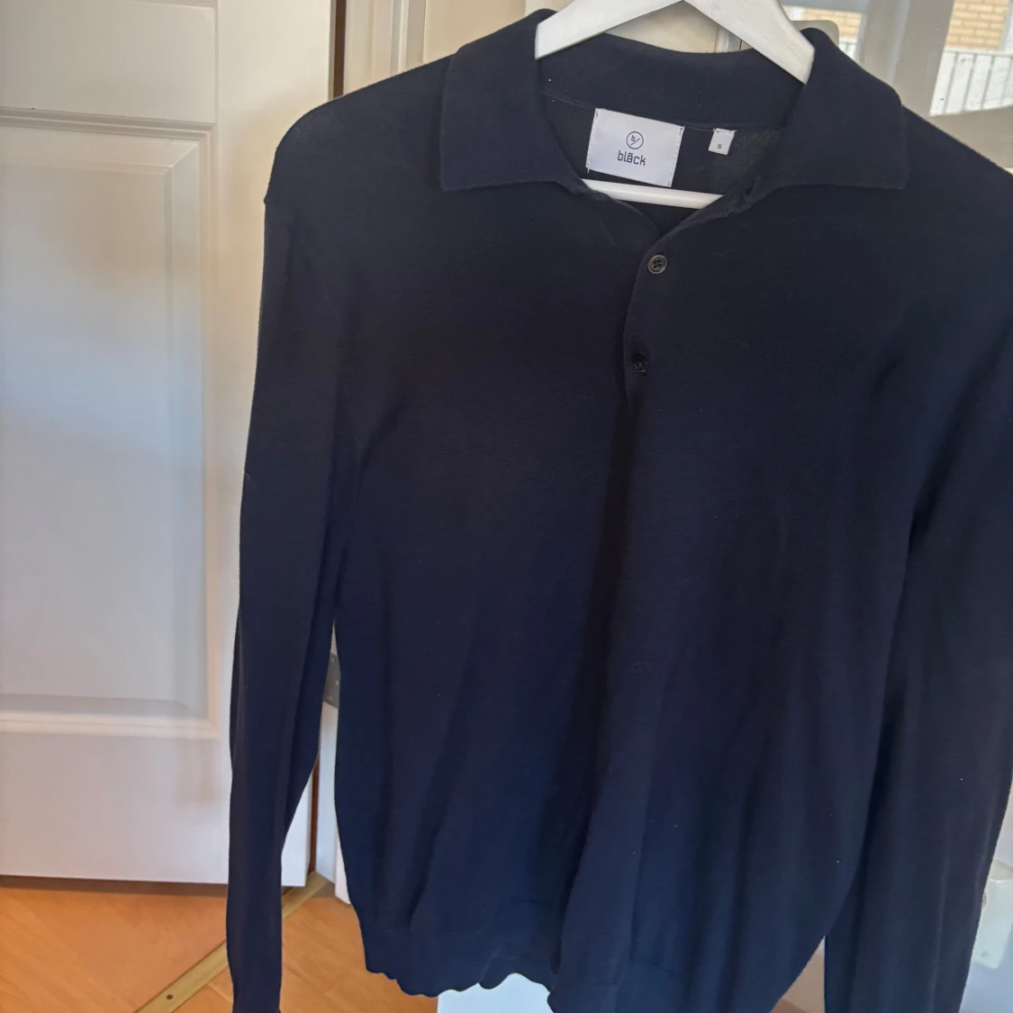 Svart pikétröja från Bläck - 1