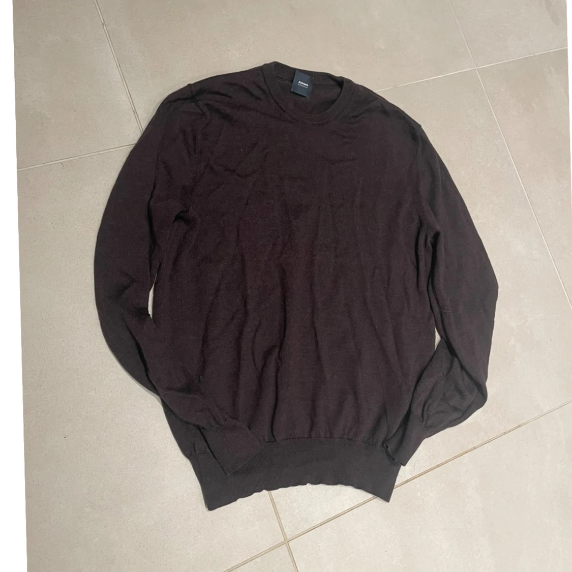 Mörkbrun stickad tröja från adverb