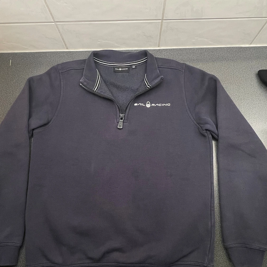 Mörkblå Sail Racing half zip tröja