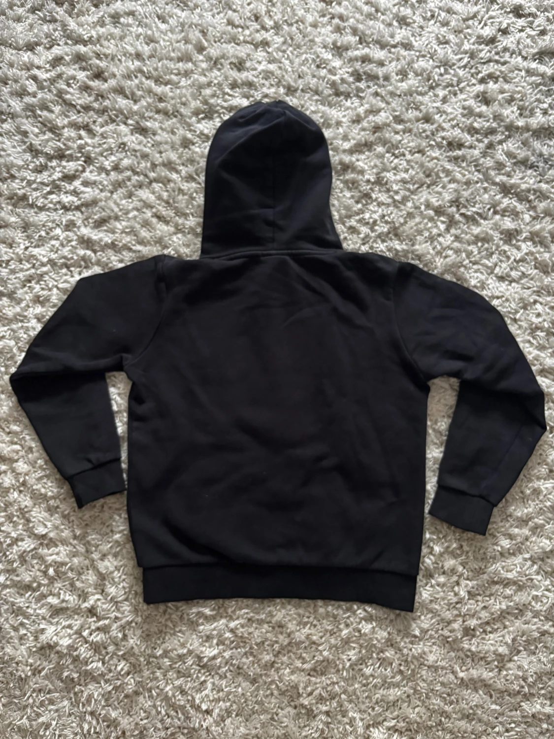 Svart hoodie från Peak Performance strl 160cm - 1