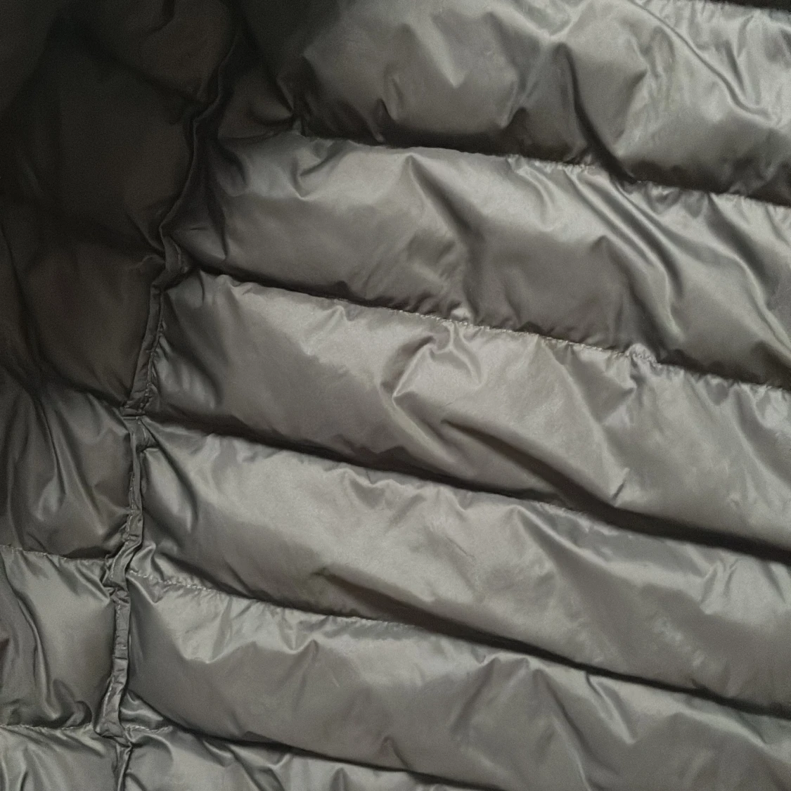 Svart pufferjacka Peak Performance 160 - 1