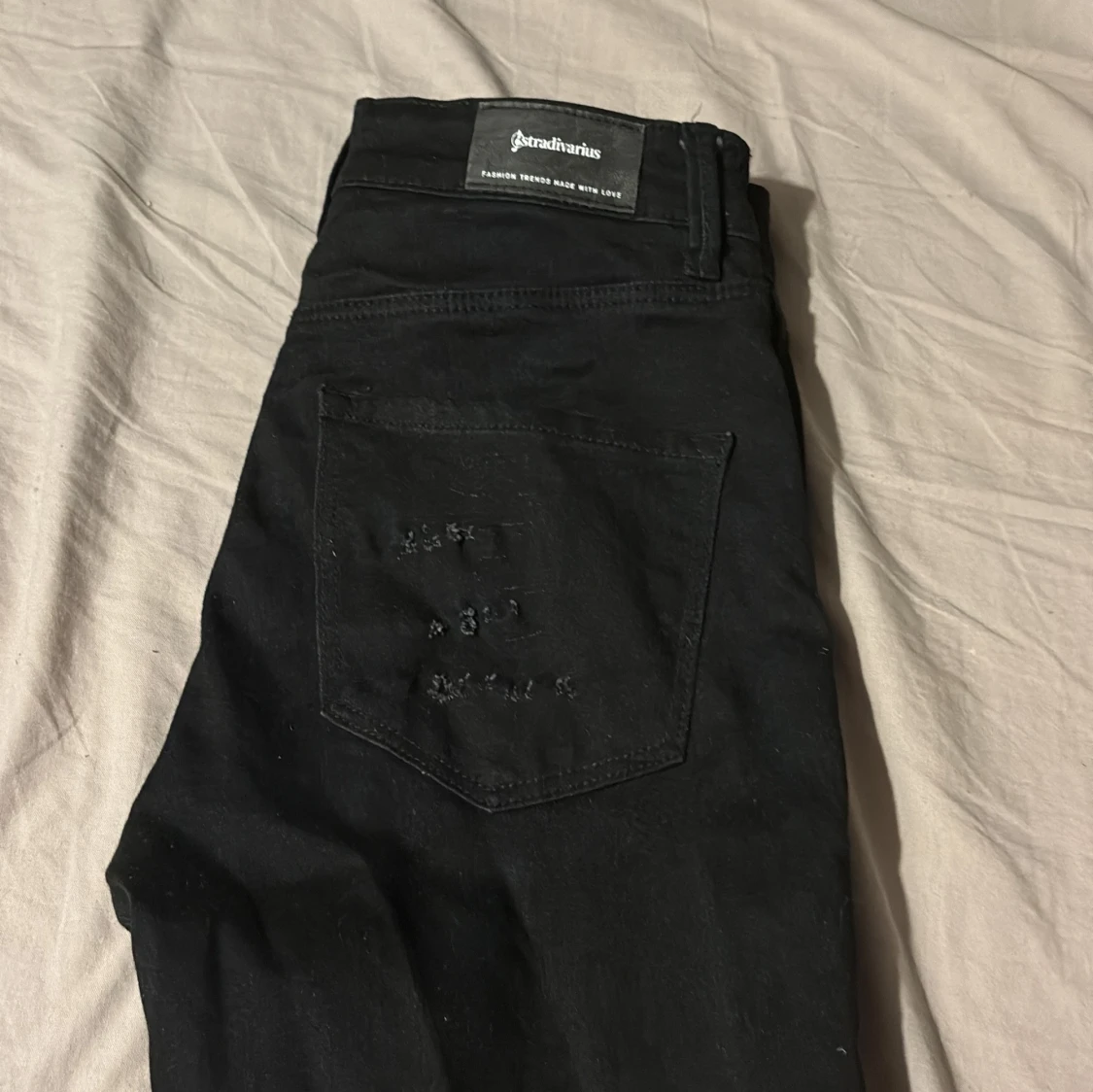 Svarta low waist jeans Stradivarius - 1