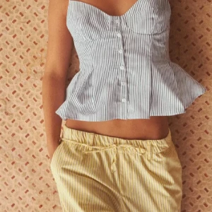 Randig korsett-topp med knappar - Randig topp från Zara som är slutsåld i storlek XS, använd en gång💕