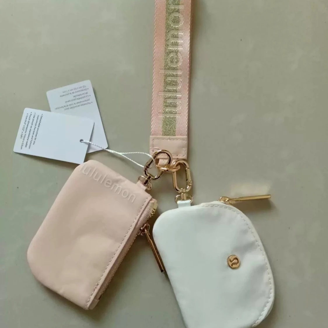 Lululemon plånbok duo i rosa och vitt