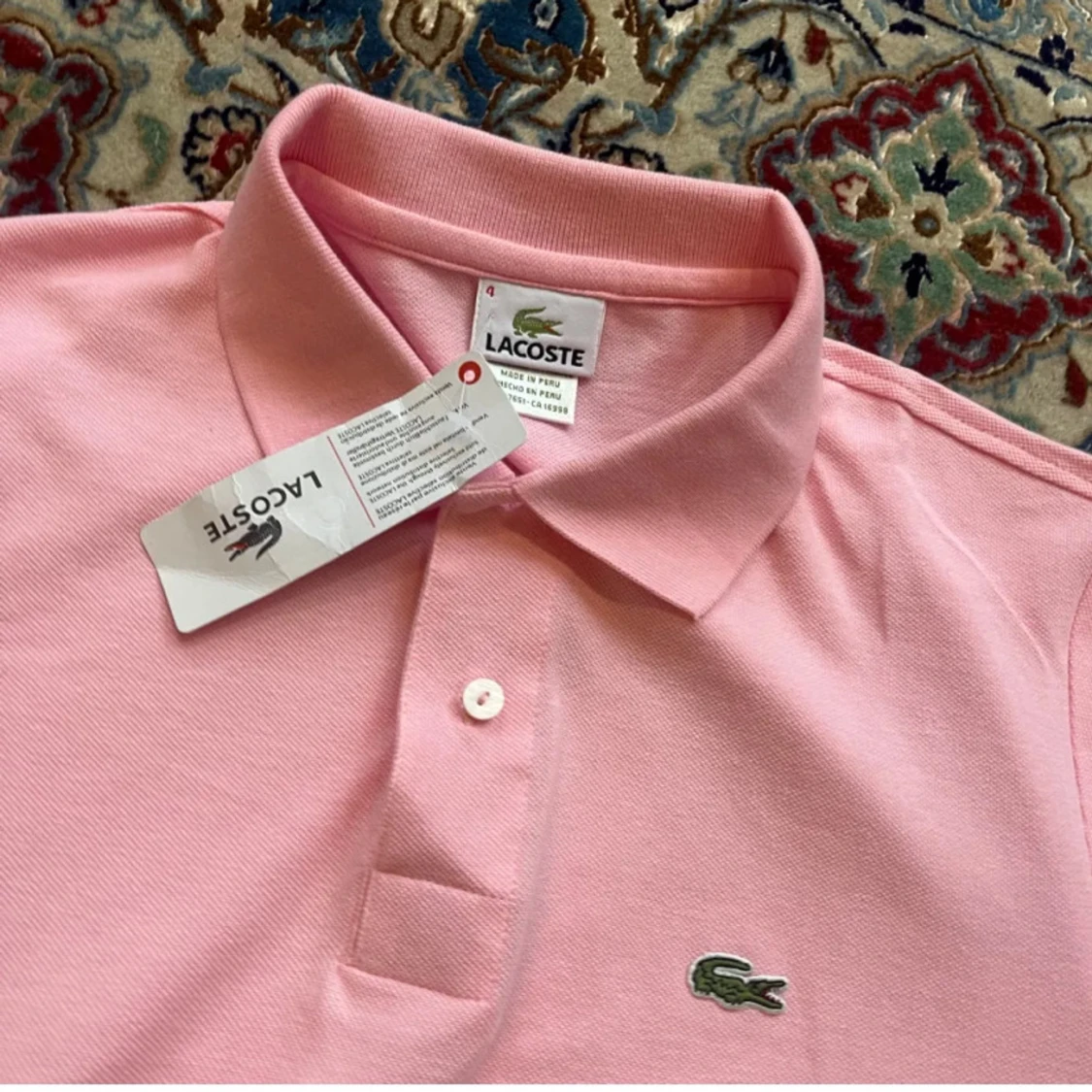 Rosa pikétröja från Lacoste - 1