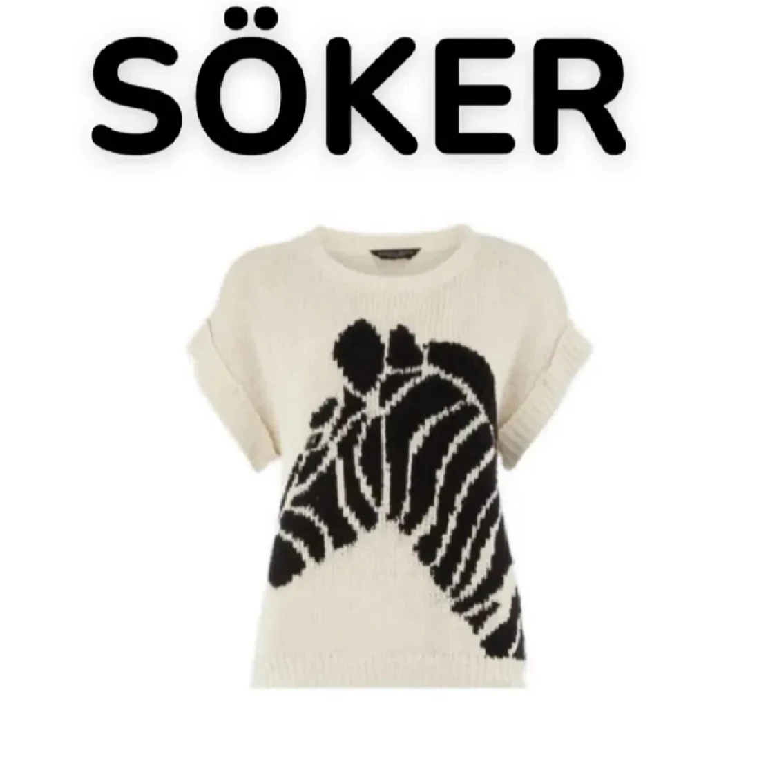 Stickad zebramönstrad tröja