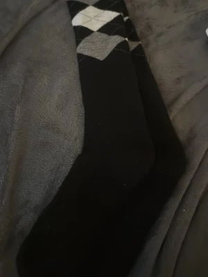 Ridstrumpor - Säljer dessa svart/mönstriga ridstrumpor då de inte kommer till användning.