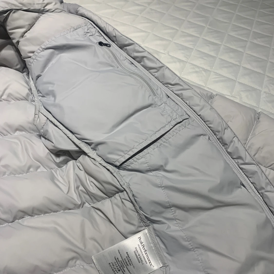 Ljusgrå dunjacka Peak Performance XS - 4