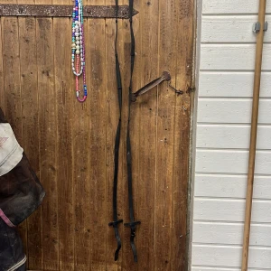 Svarta tyglar - Svarta tyglar i storlek full i fint skick