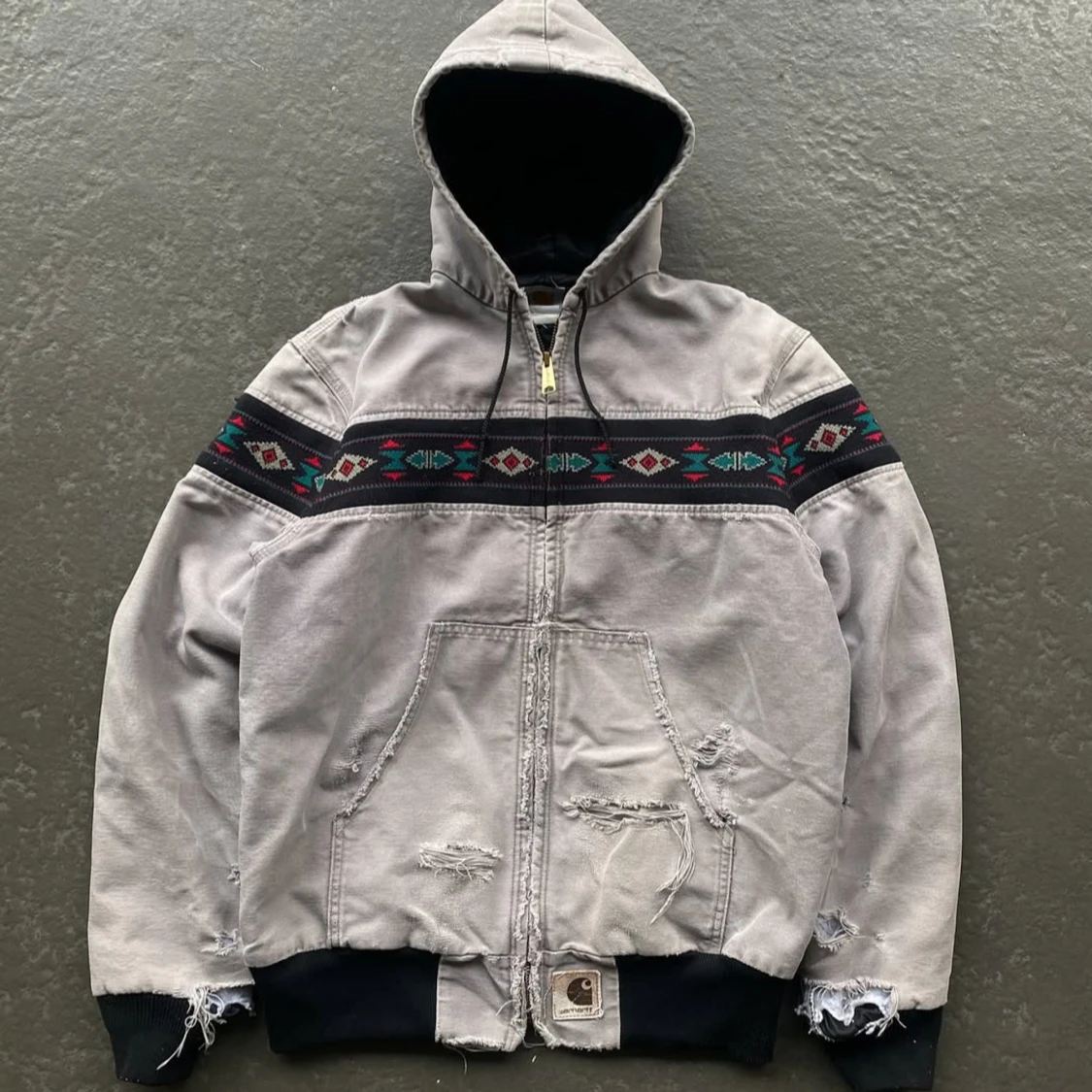 Grå Carhartt bomberjacka med mönster