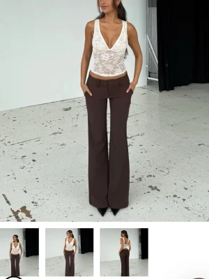 Bruna kostymbyxor venderbys - Bruna kostymbyxor ifrån venderbys, de är aldrig använda och har prislappen kvar