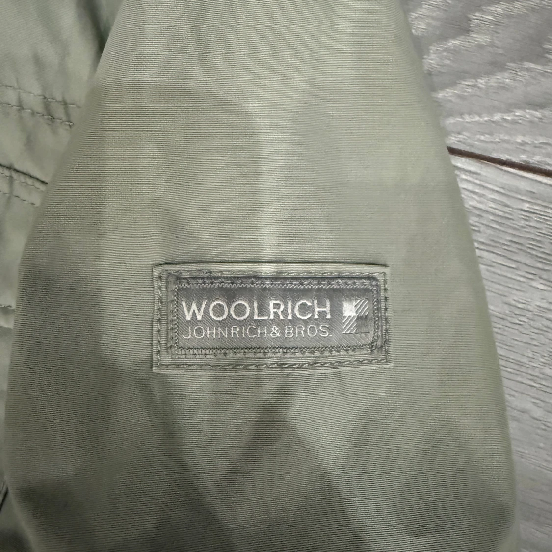 Beige fieldjacka från Woolrich - 1