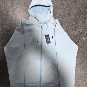 Polo Ralph Lauren Zip-up Hoodie - Never worn, brand new, runs a bit small.